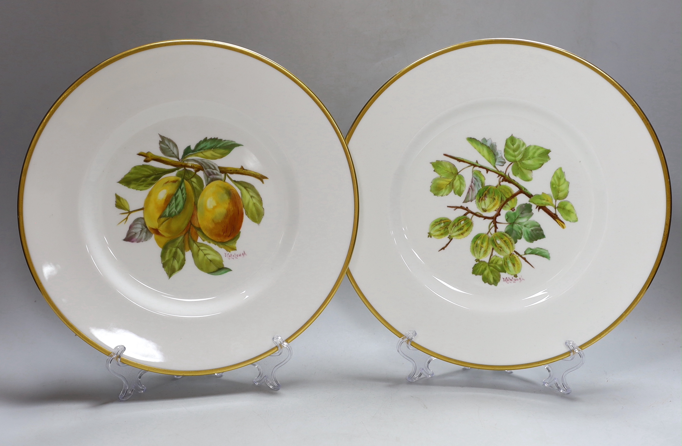 A pair of Minton plates painted with fruit by Colclough, signed, Crown, Globe England mark in puce, c.1891-1921, 27cm diameter